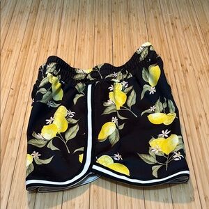 Woman’s lemon print track shorts. Size S. 
Some discoloration on inside only.